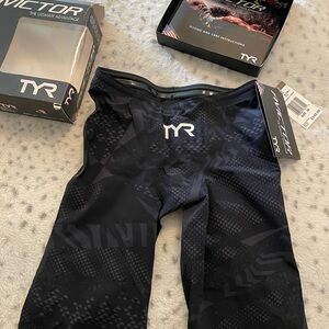 TYR Black Avictor Prelude Jammer Tech suit. New in box with tags attached. Size